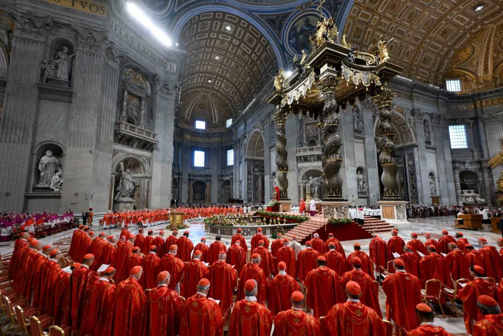 Cardinals pray as conclave rituals begin